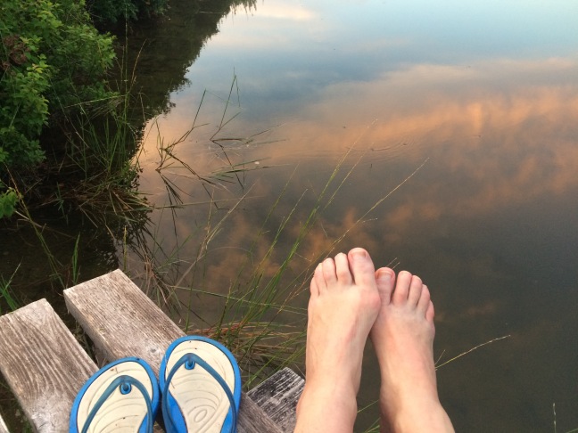 my feet with sunset